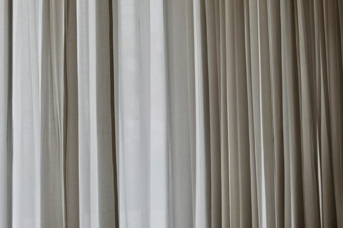 white and gray window curtain